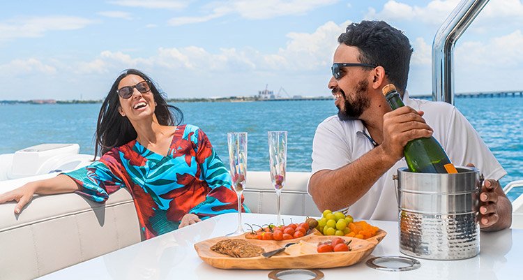 Guests enjoying time aboard an Aquila yacht